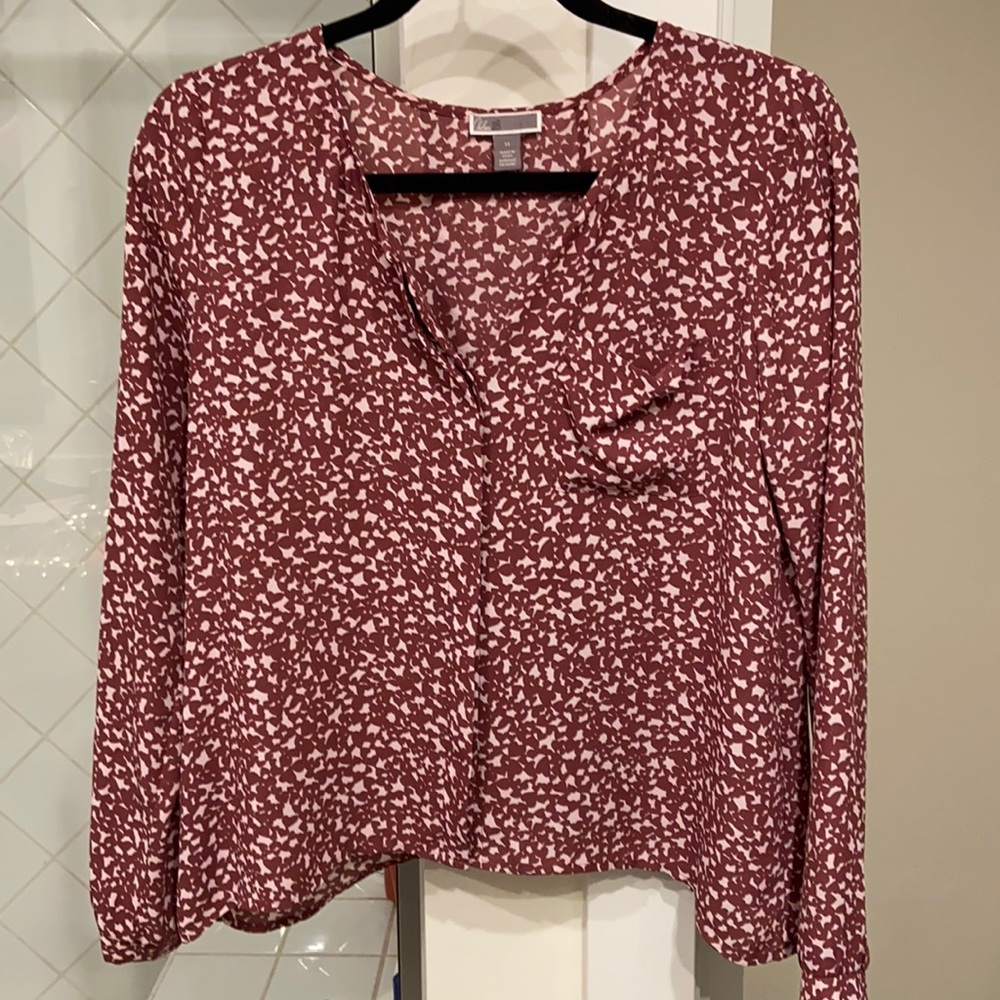 Cropped, open back, printed blouse.